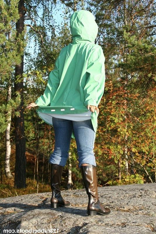 20P Hot girl in tight jeans and rubber rainwear