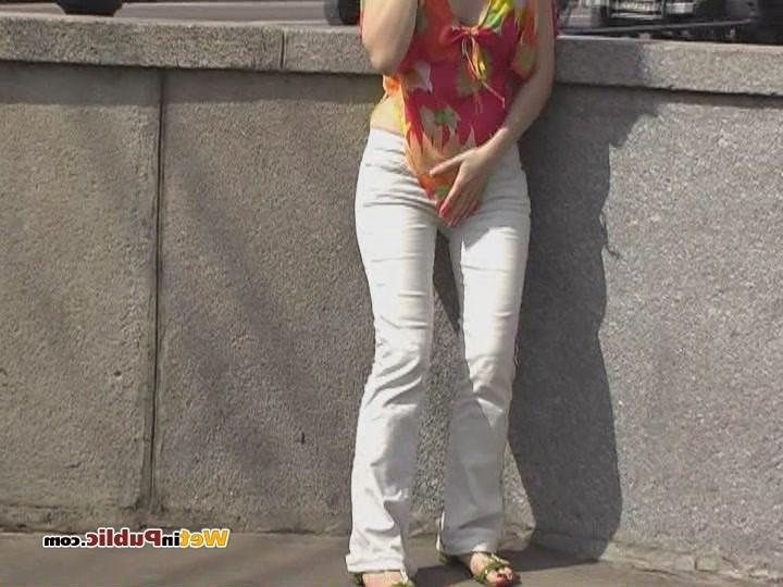 15P Totally pee-soaked jeans and shaven pussy of an ablush public pisser