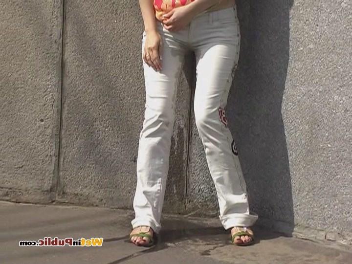 15P Totally pee-soaked jeans and shaven pussy of an ablush public pisser