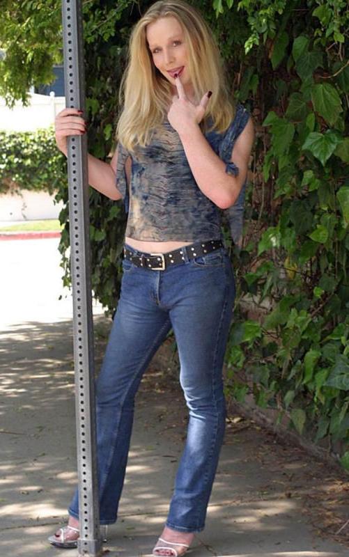 20P Blond tranny shows cock in backyard