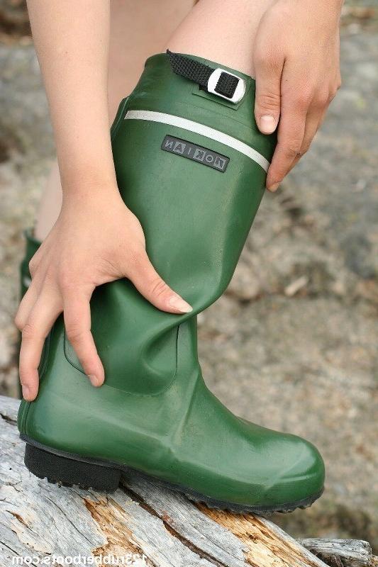 20P Girl in rubber boots and rain coat
