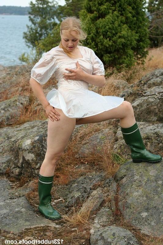 20P Girl in rubber boots and rain coat