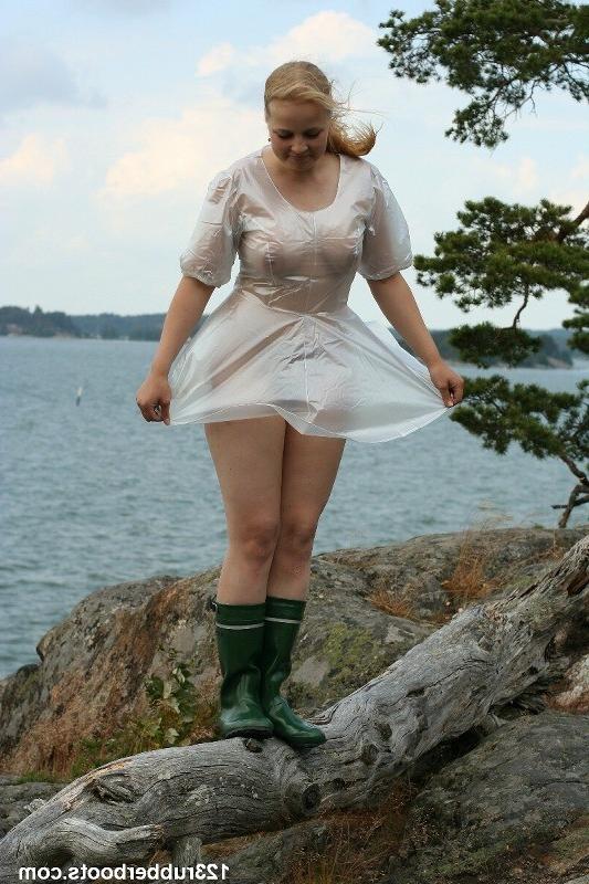 20P Girl in rubber boots and rain coat