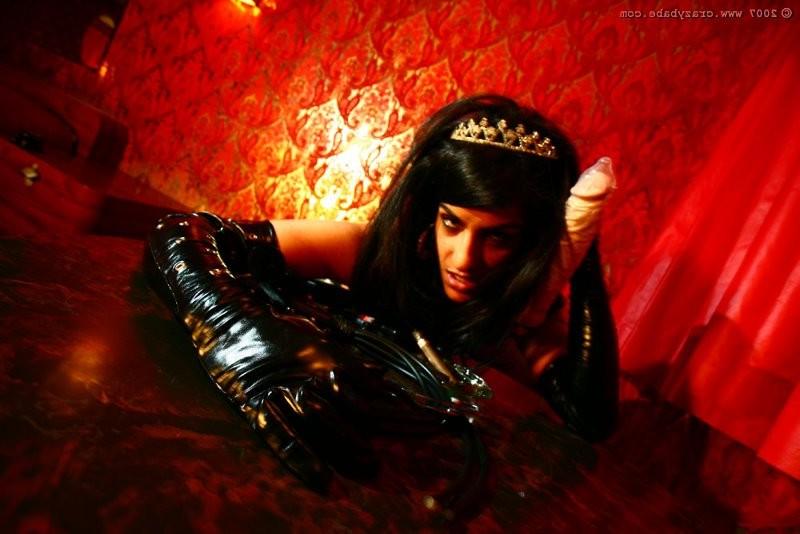 20P Weird fetish pissing babe with a knife and a dildo