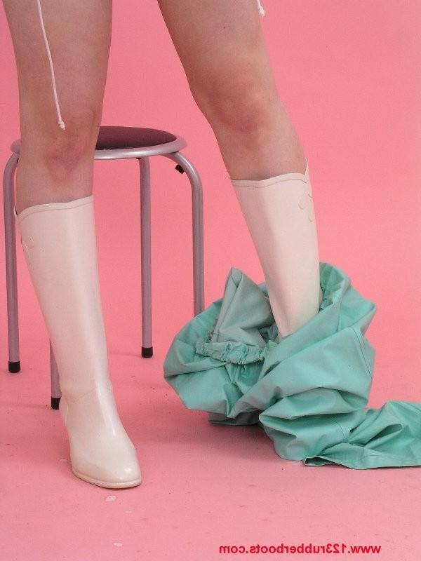 20P Girl with big tits in rubber boots and rainwear
