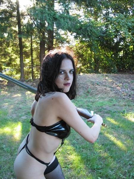 16P Gothic girl in latex posing with a sword