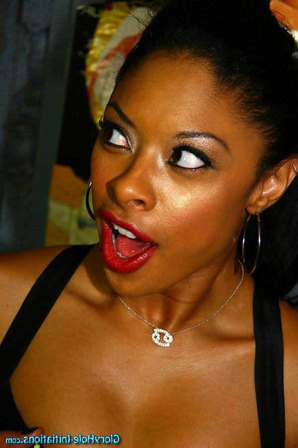 18P kinky ebony  babe sucking off a white cock at a  glory hole