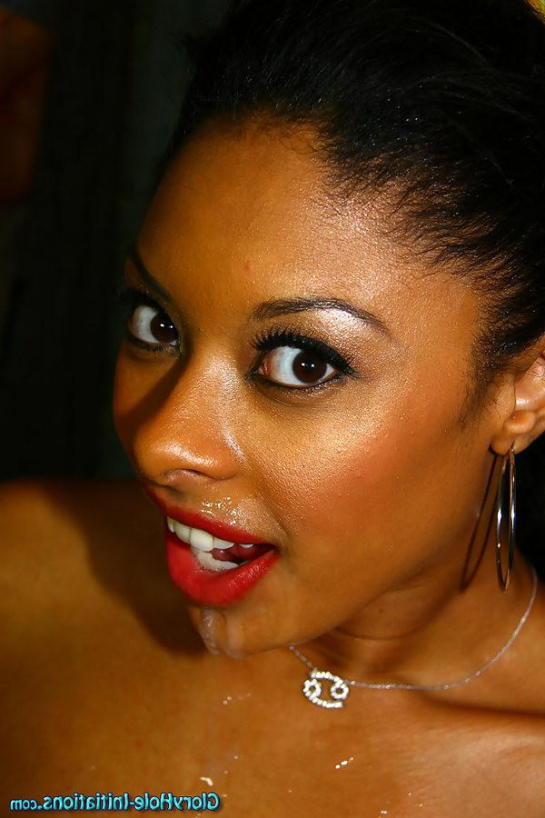 18P kinky ebony  babe sucking off a white cock at a  glory hole