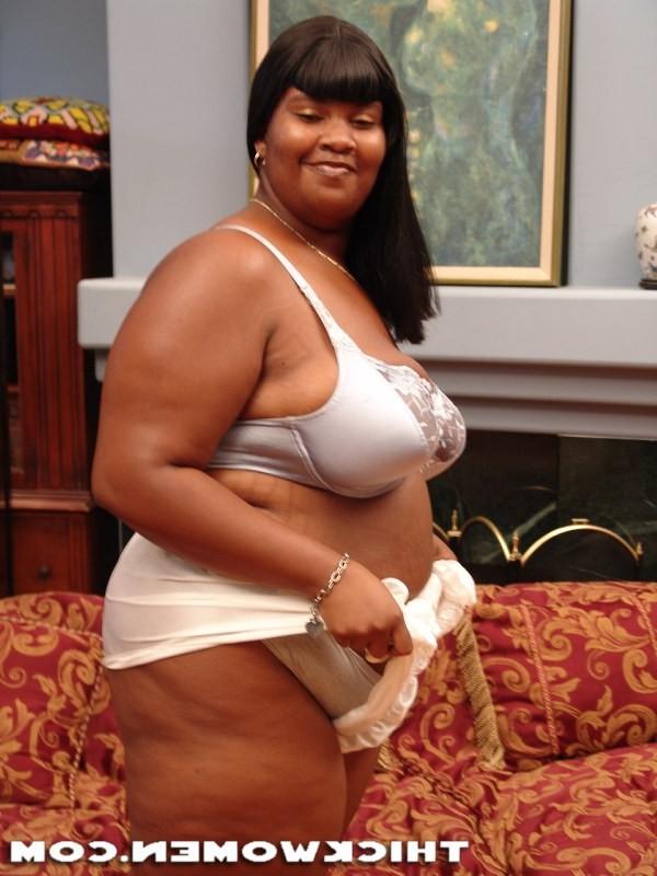 15P Hot black mama showing off her big tits and huge ass