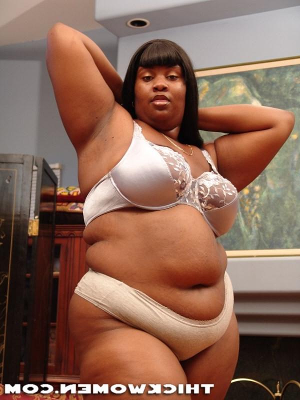15P Hot black mama showing off her big tits and huge ass