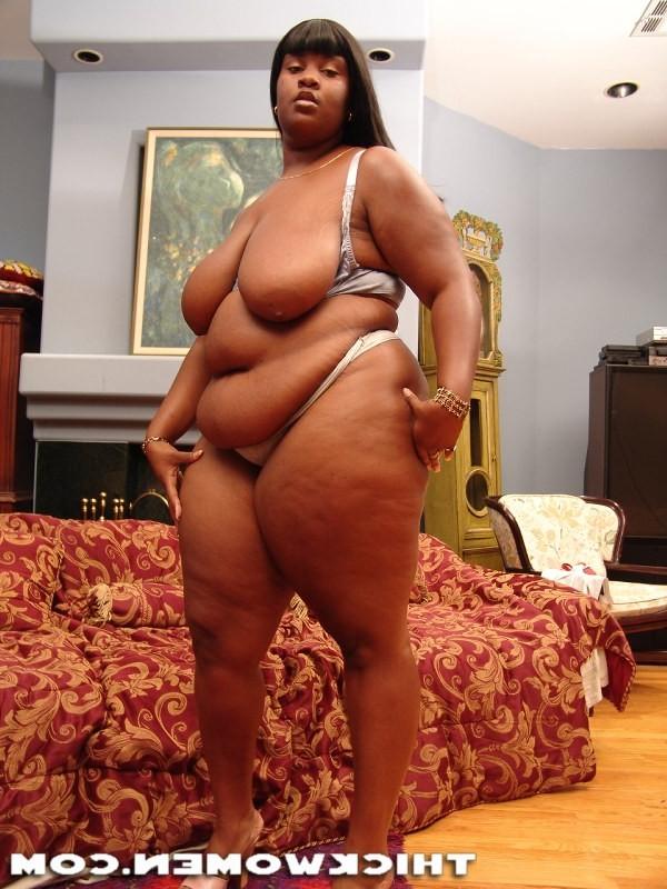 15P Hot black mama showing off her big tits and huge ass