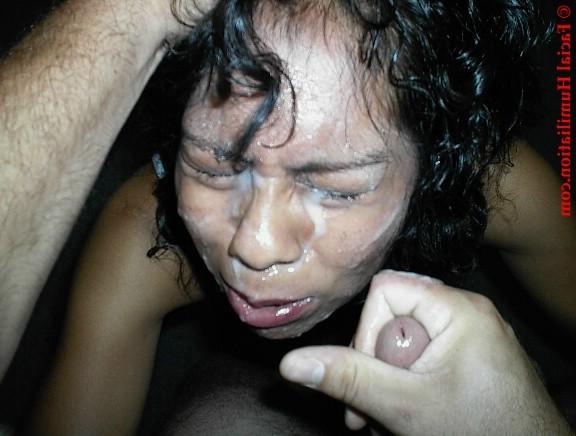 16P black whore gets her face covered in white cream