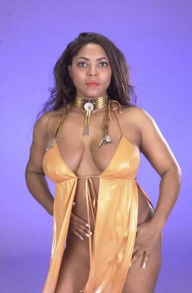 16P Black girl showing her large natural breasts