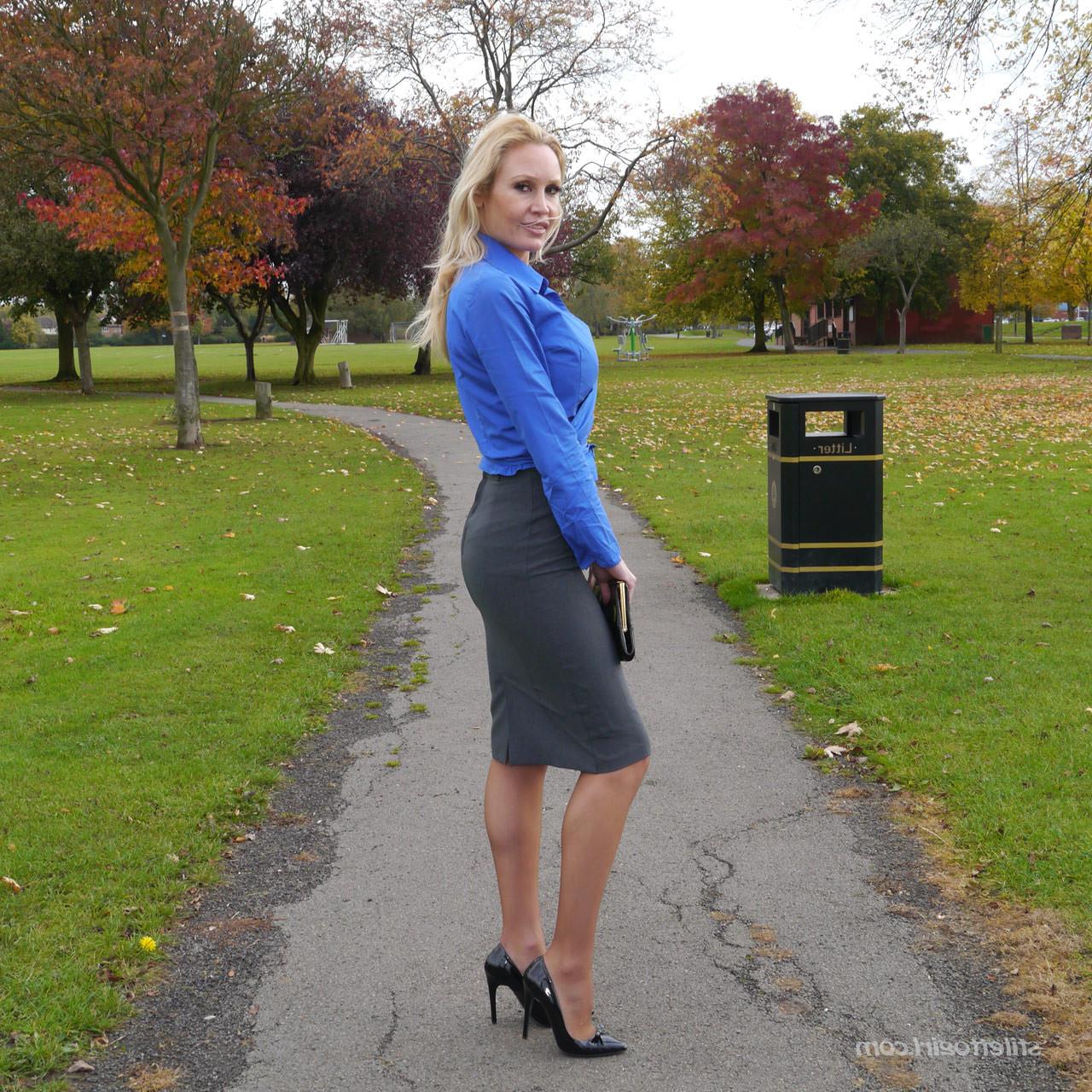 16P Hot blonde Milf Monica shows off her hot legs and shiny black st