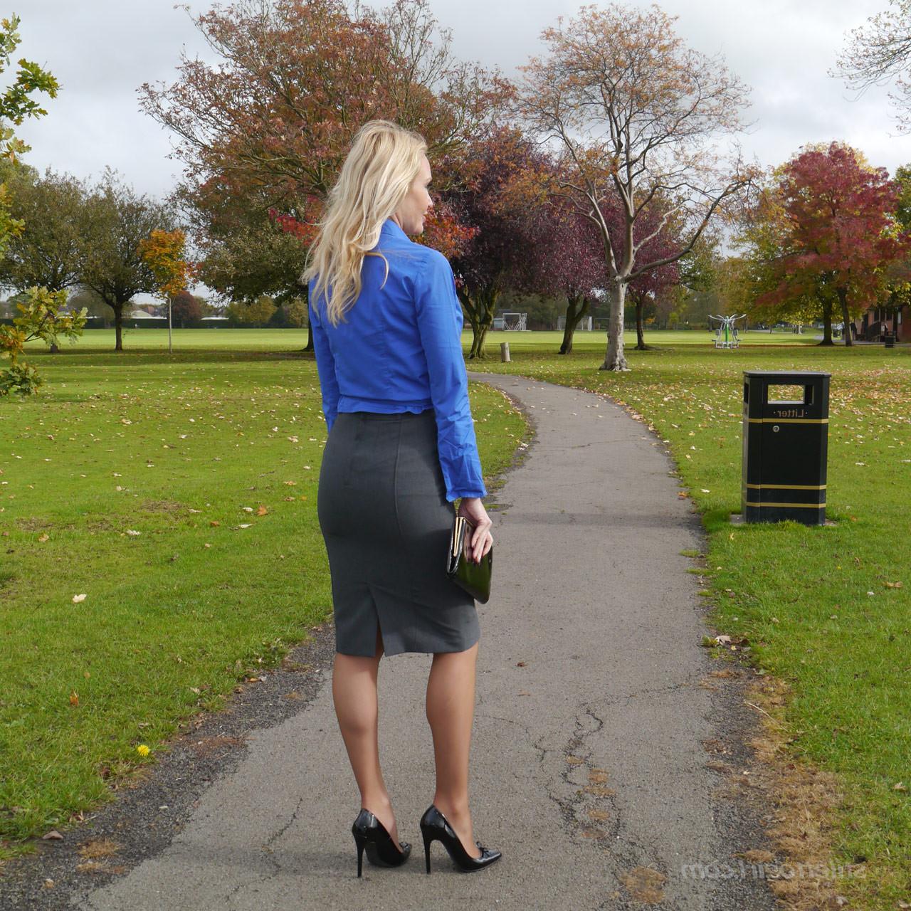 16P Hot blonde Milf Monica shows off her hot legs and shiny black st