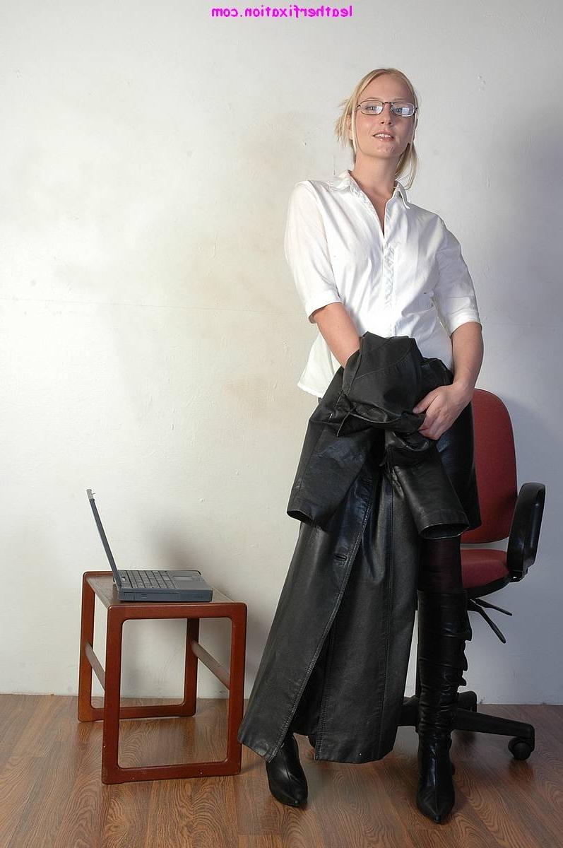 15P Sexy blonde secretary takes off her leather trench coat and teases her pussy in 