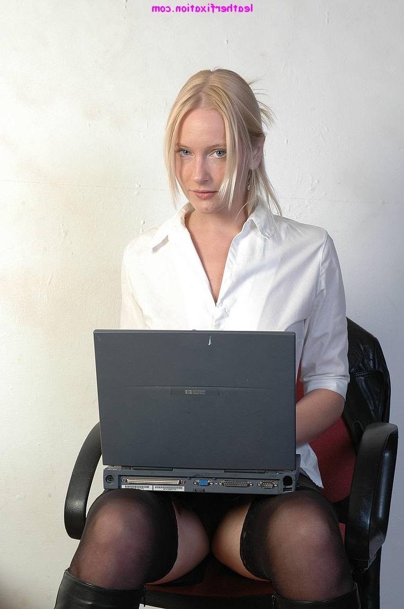 15P Sexy blonde secretary takes off her leather trench coat and teases her pussy in 