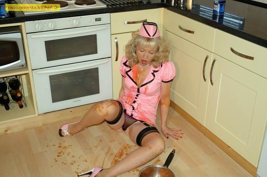 12P Kiny housewife Sue as nurse in her kitchen