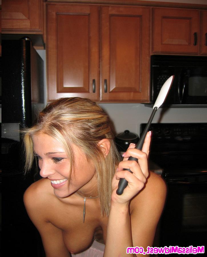 15P Blonde hottie playing around in kitchen