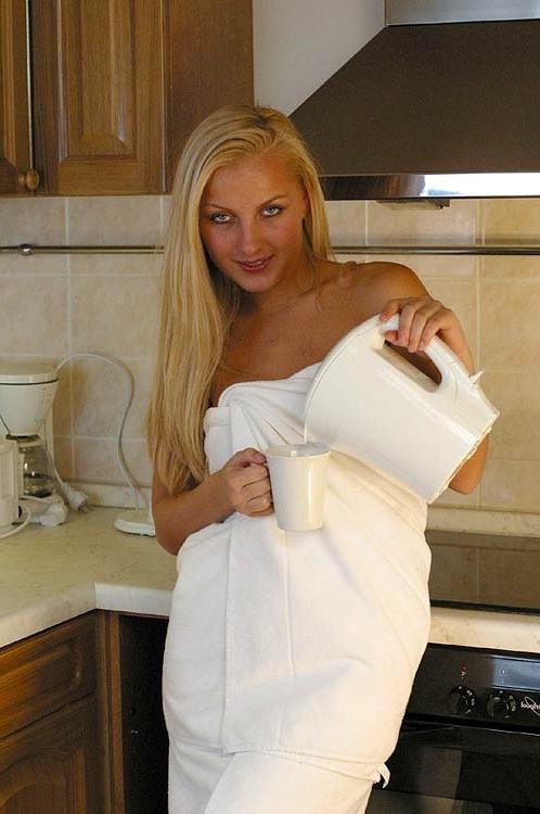 16P Babe teasing in her kitchen after a shower