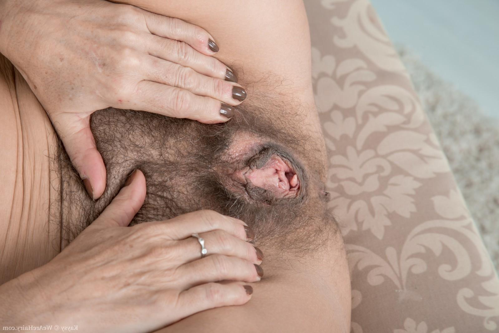 16P Kaysy strips and gets naked on her sofa 
