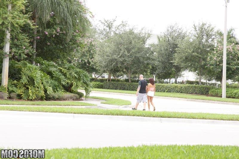 17P Amateur brunette fucking her pussy in public in the street