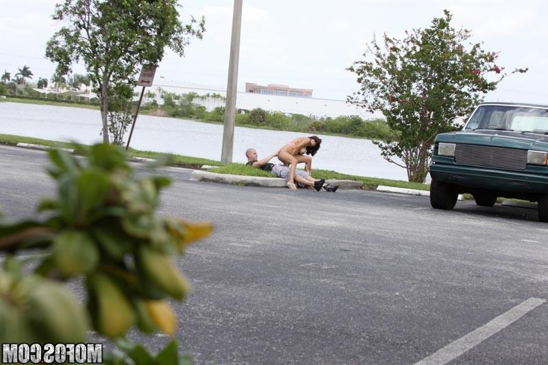 17P Amateur brunette fucking her pussy in public in the street