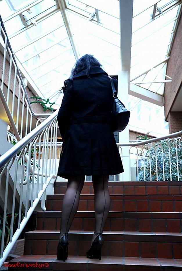 12P Lady Justine in stockings posing in public