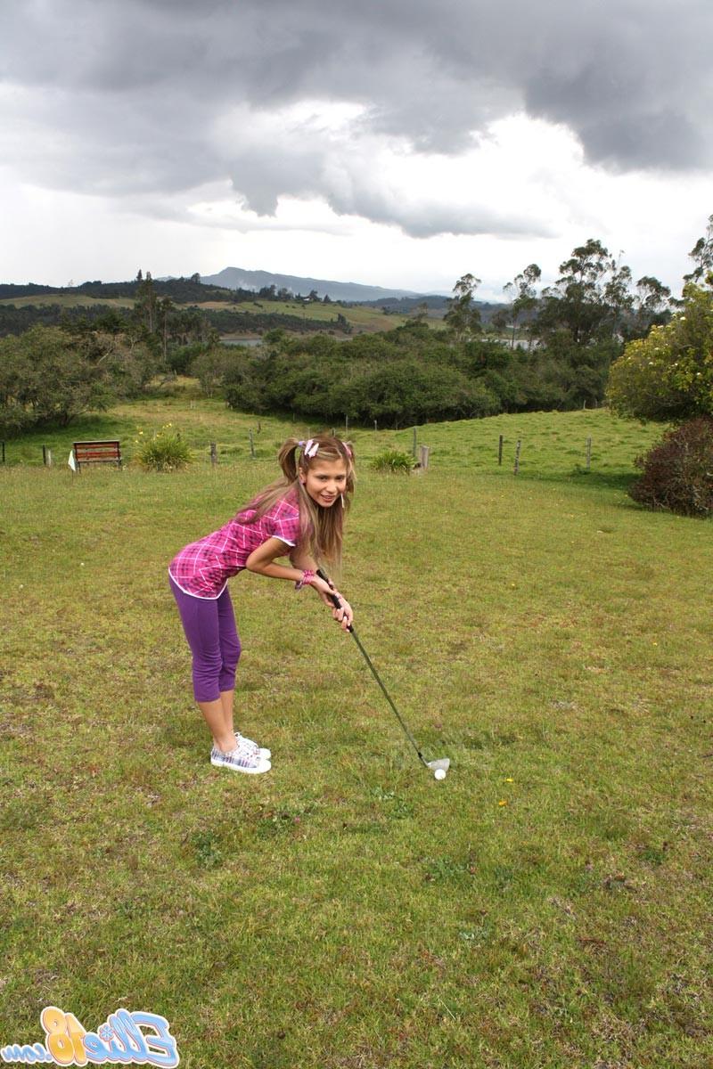 16P Small teen with pigtails playing golf nude
