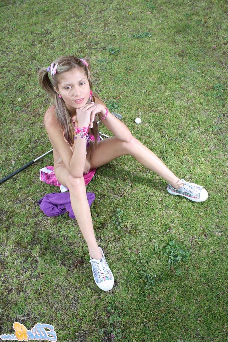 16P Small teen with pigtails playing golf nude