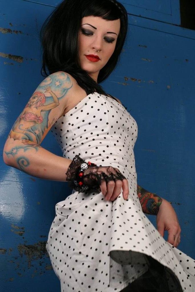 15P Tattooed brunette teen posing