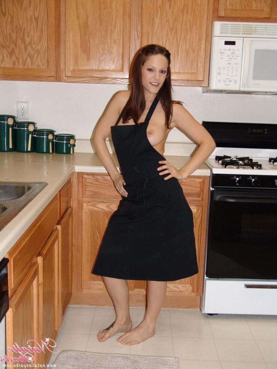 15P Busty brunette teen babe acting sexy in the kitchen