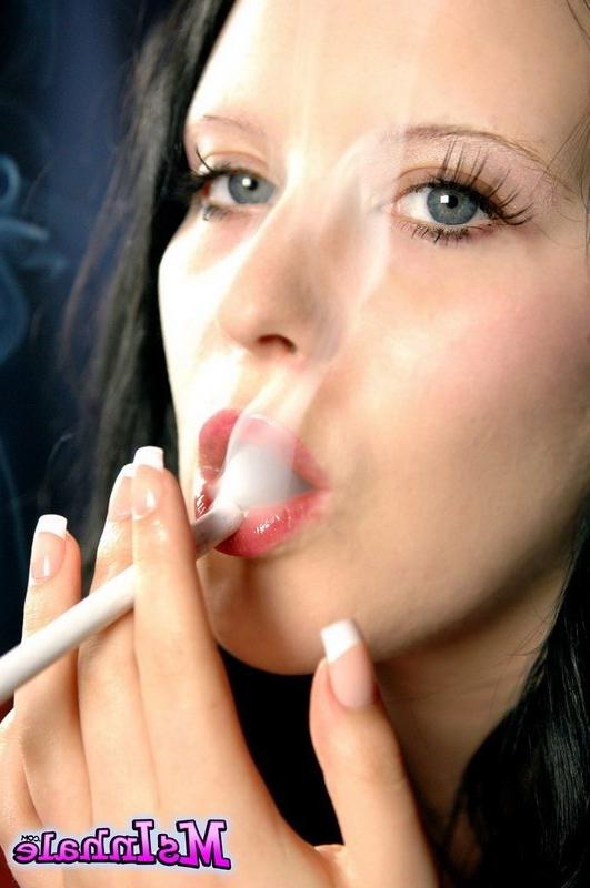 16P brunette teen smoking a cigarette