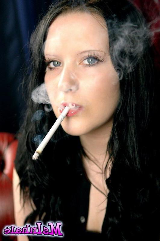 16P brunette teen smoking a cigarette