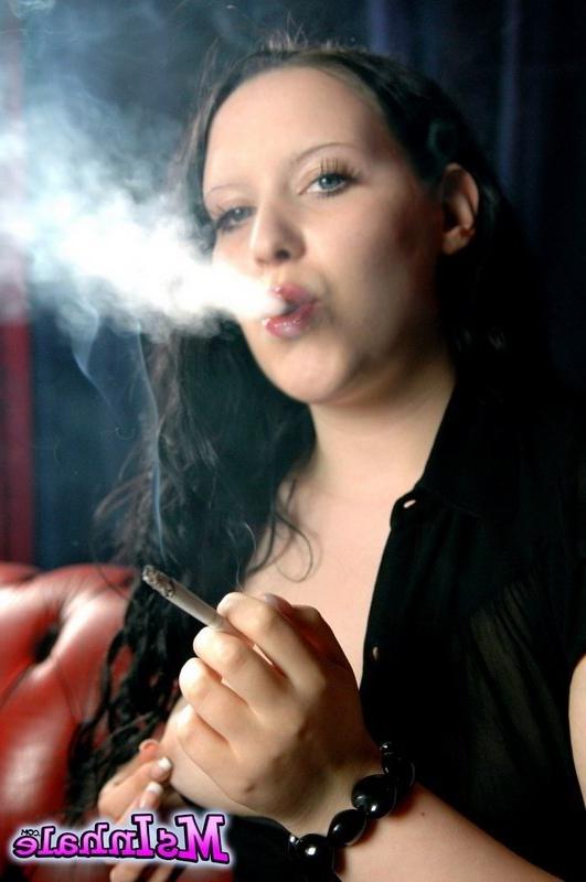 16P brunette teen smoking a cigarette