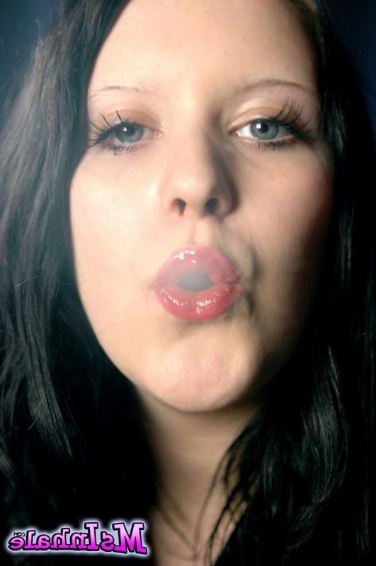 16P brunette teen smoking a cigarette