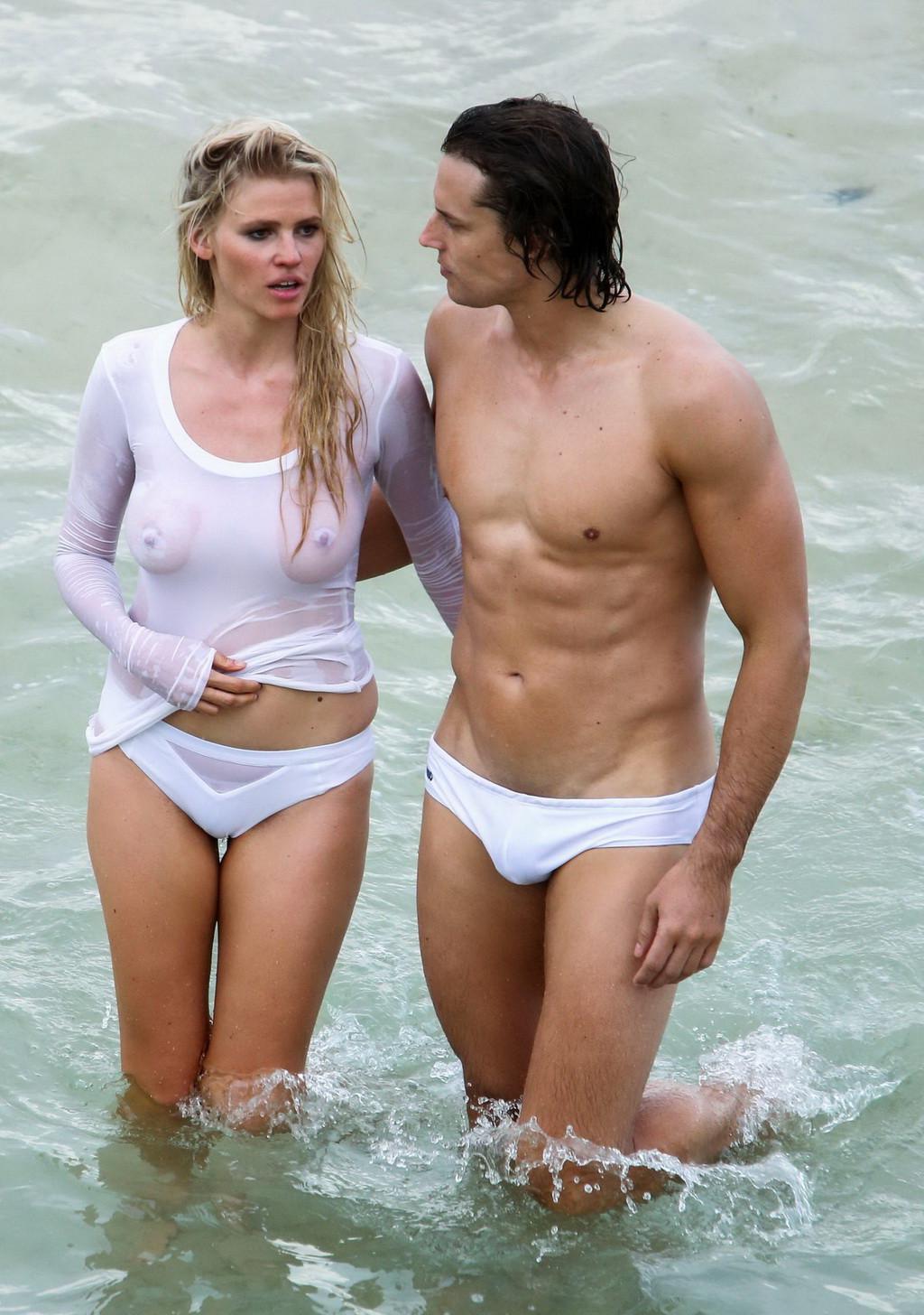 16P Lara Stone showing boobs in wet top and bikini bottom