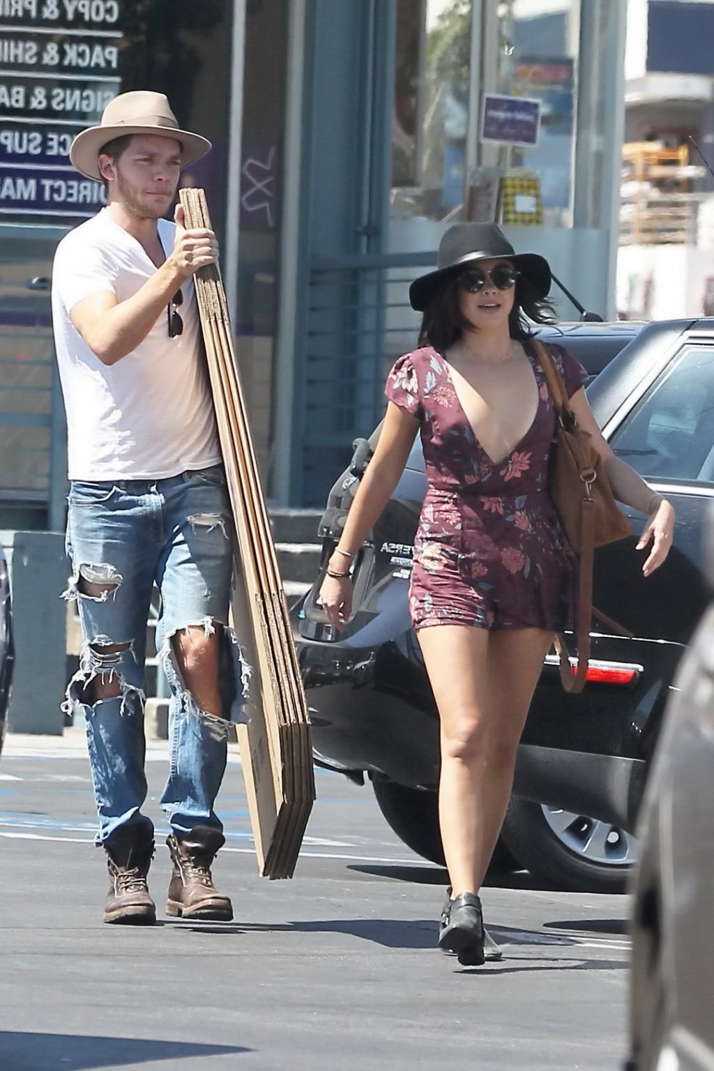 16P Sarah Hyland hot nipple slip in a tiny floral outfit