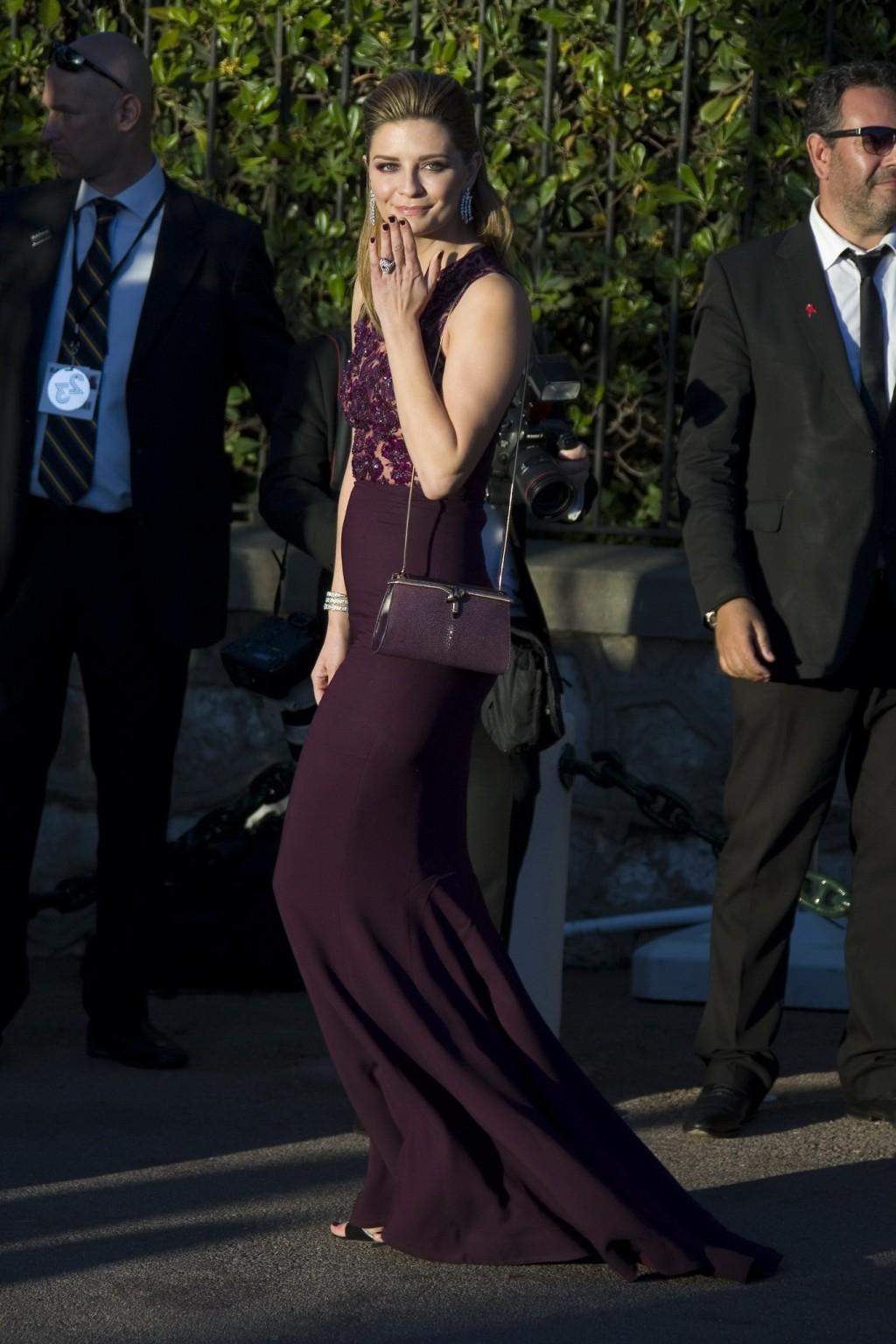 16P Mischa Barton braless in a purple sheer lace dress