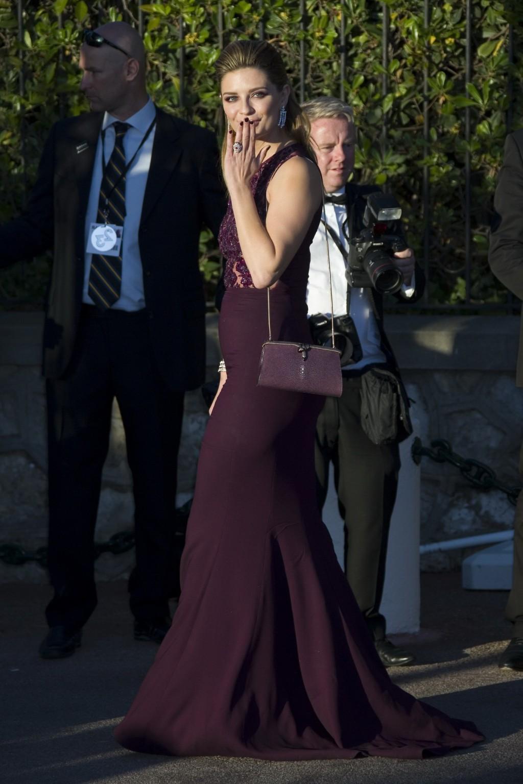 16P Mischa Barton braless in a purple sheer lace dress