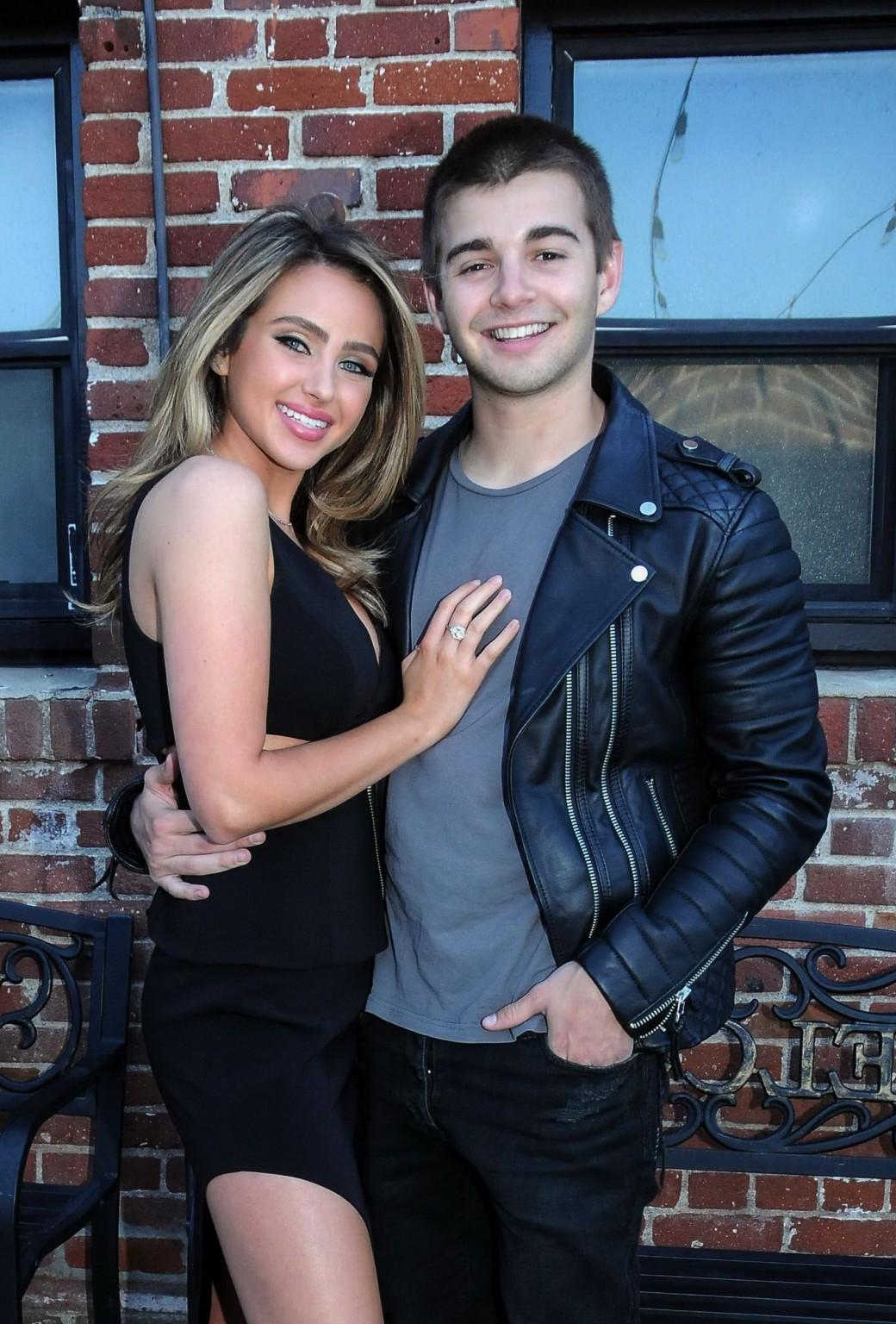 16P Ryan Newman showing big cleavage in black mini dress