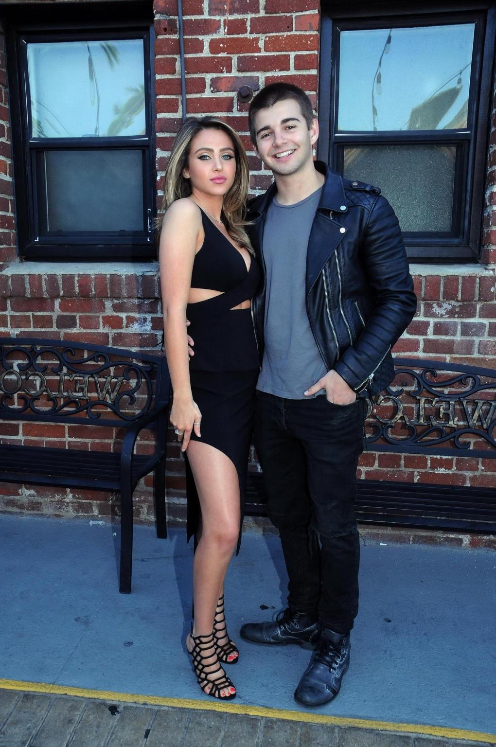 16P Ryan Newman showing big cleavage in black mini dress