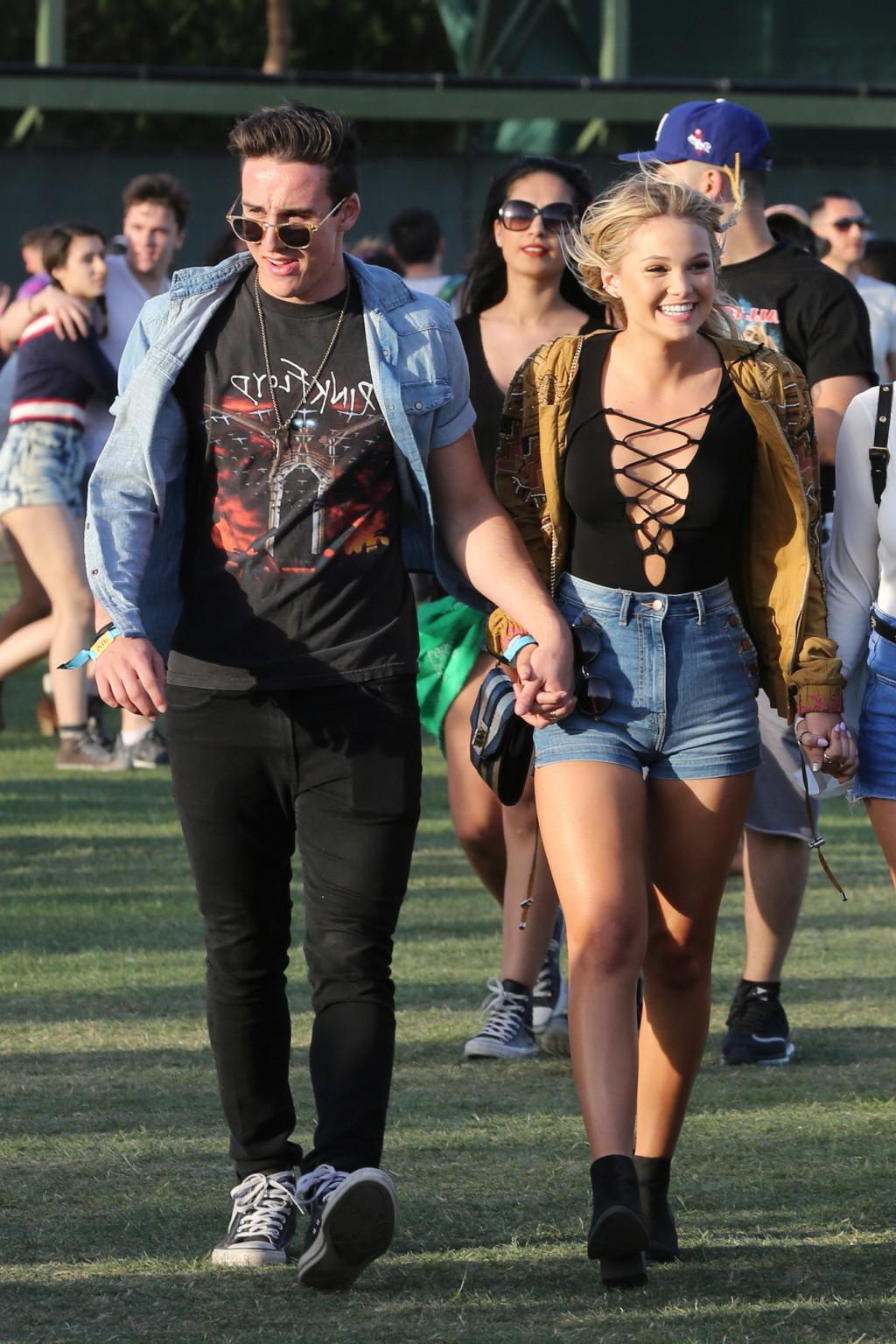 16P Olivia Holt braless showing huge cleavage and legs