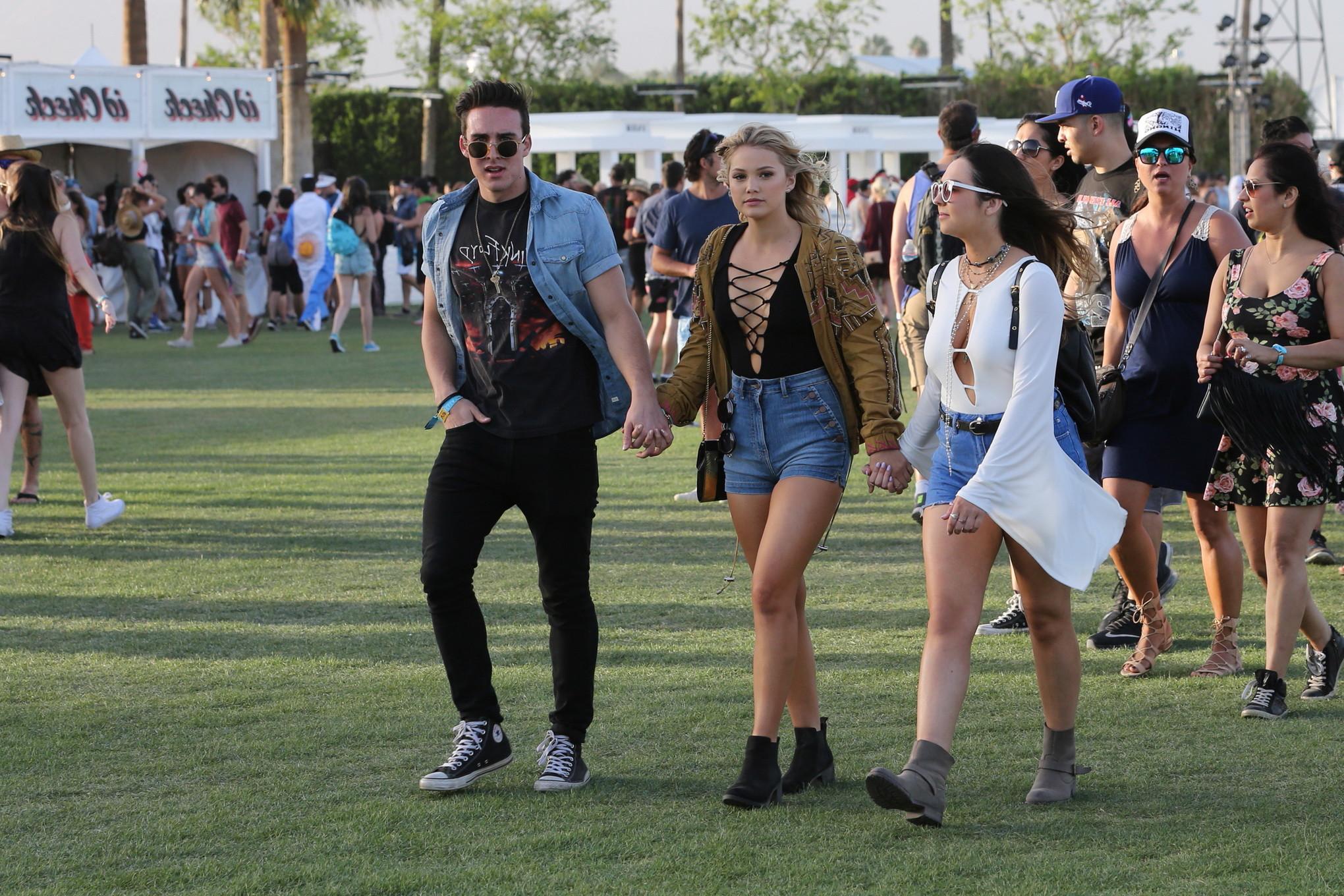 16P Olivia Holt braless showing huge cleavage and legs