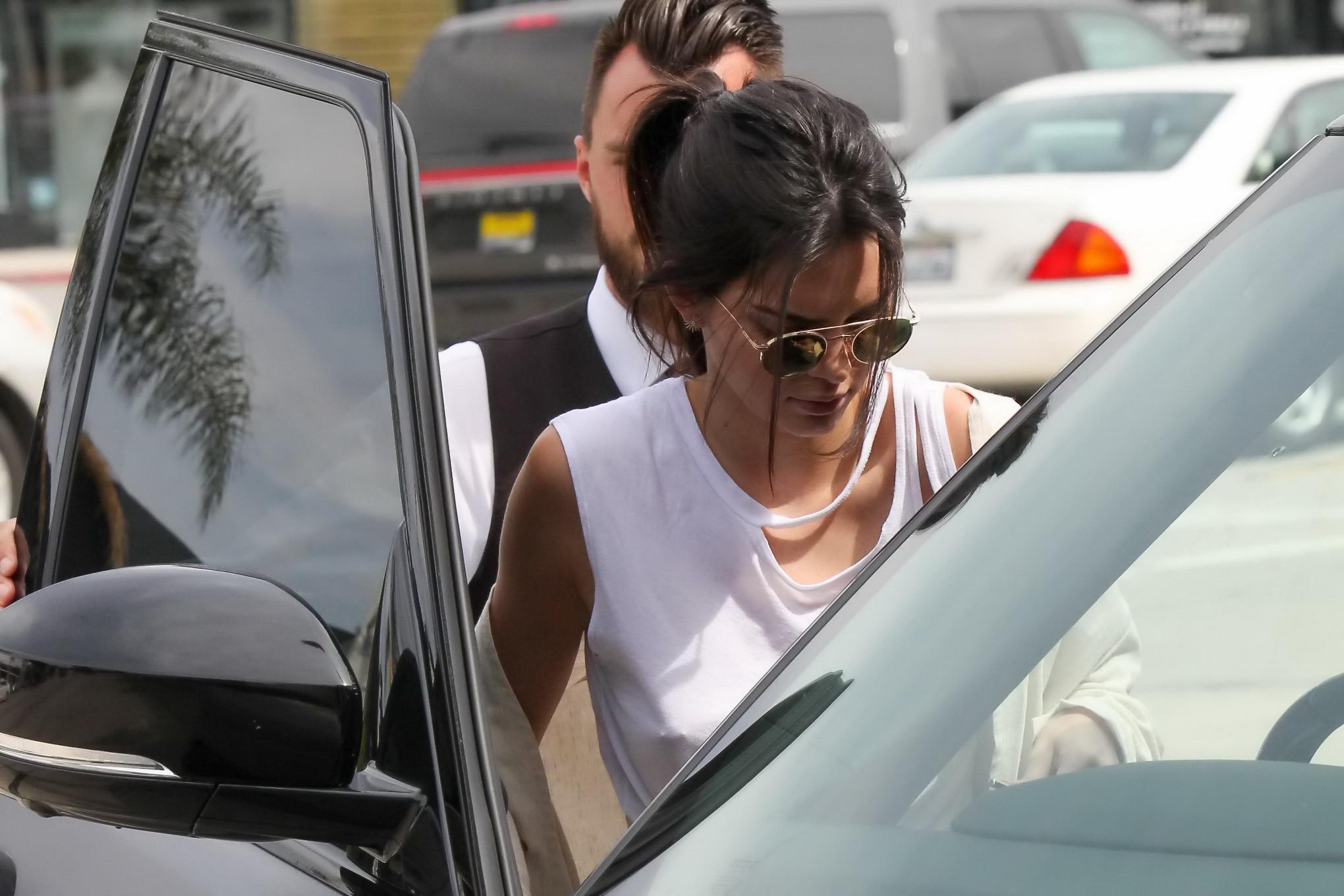 16P Kendall Jenner showing pokies and nipple piercing