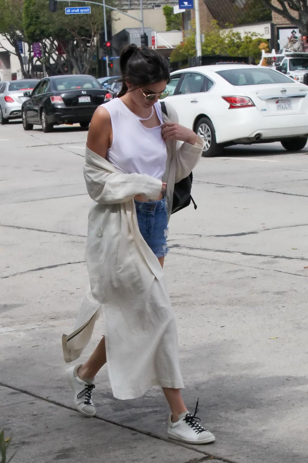 16P Kendall Jenner showing pokies and nipple piercing