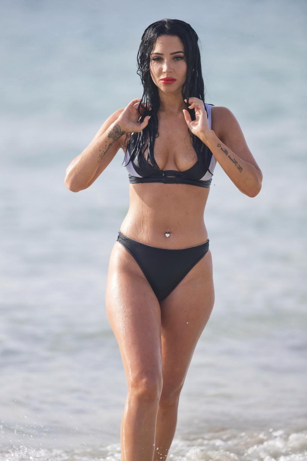16P Tulisa Contostavlos monochrome bikini nipple slip