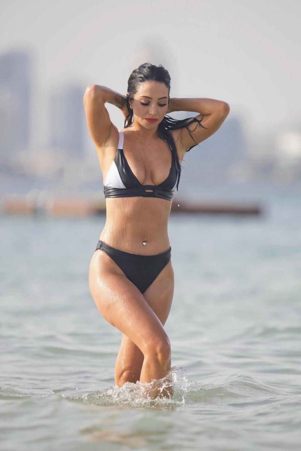 16P Tulisa Contostavlos monochrome bikini nipple slip