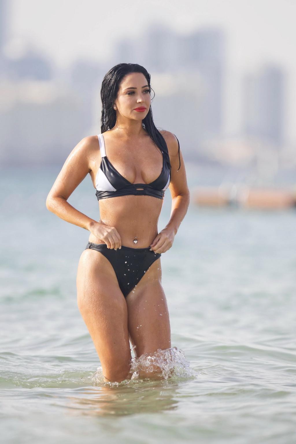 16P Tulisa Contostavlos monochrome bikini nipple slip
