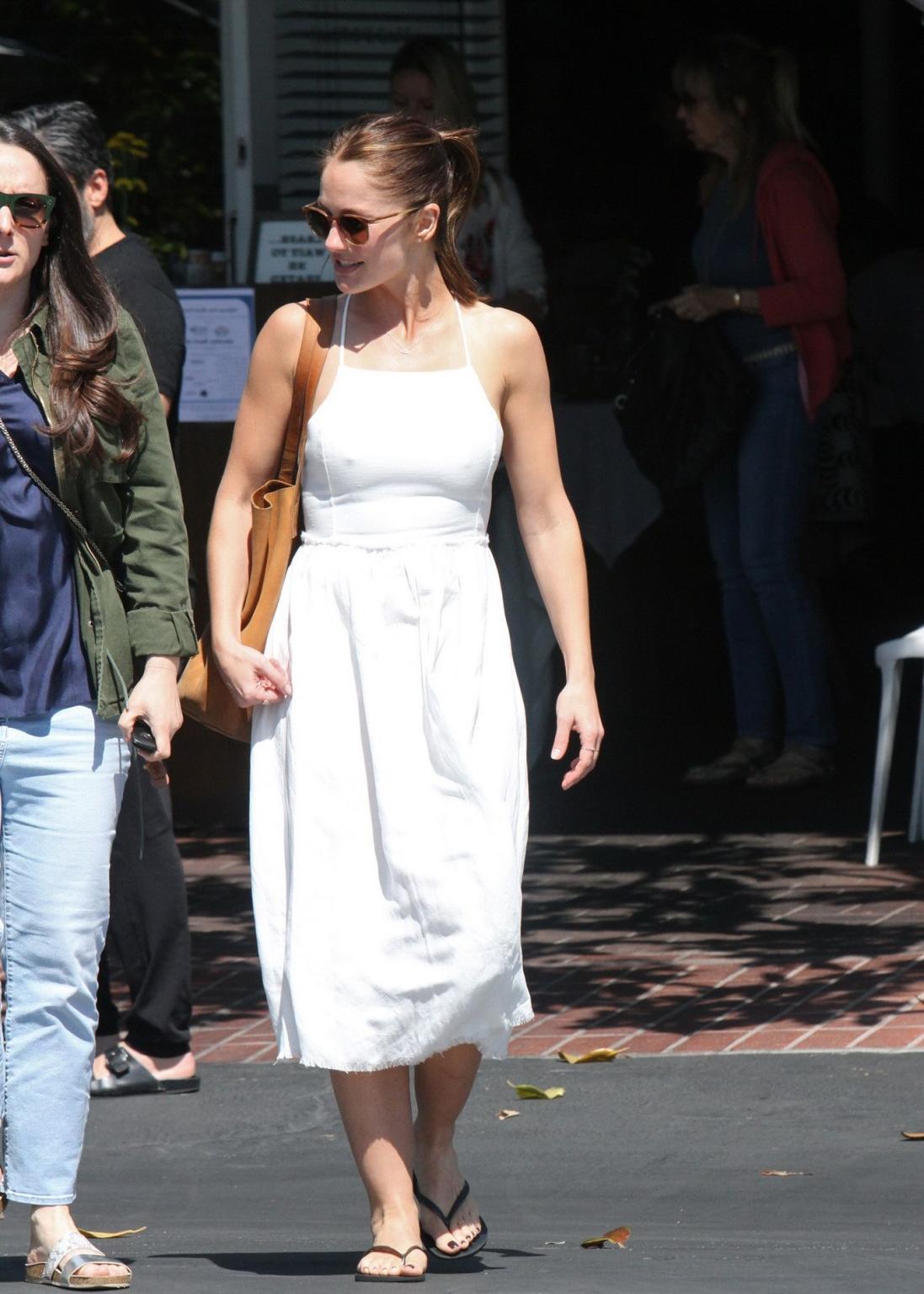 16P Minka Kelly showing nipple pokies in a sexy white dress
